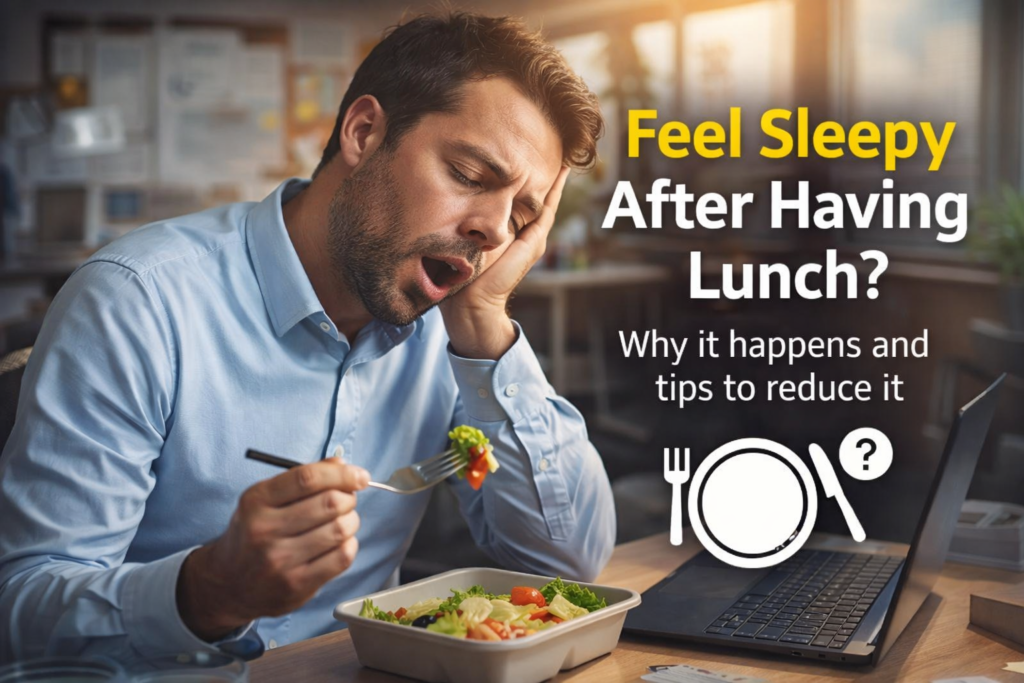 Man feeling sleepy after having lunch while working at desk explaining causes of post lunch fatigue